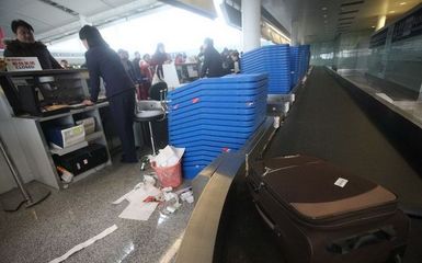 揭秘登機時行李遭到的&ldquo;待遇&rdquo; 探托運全過程